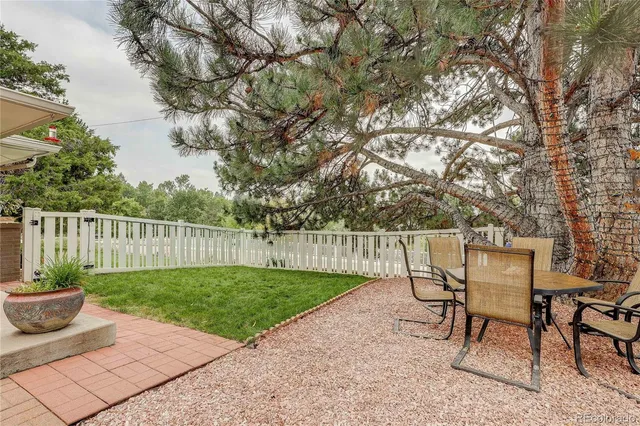 a garden view with a seating space