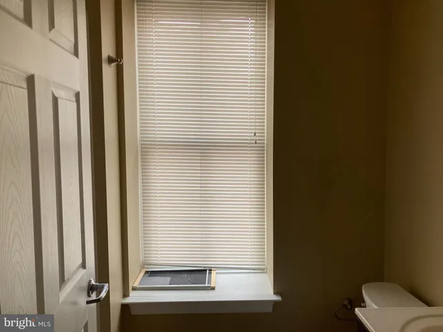 a view of a bathroom with a window