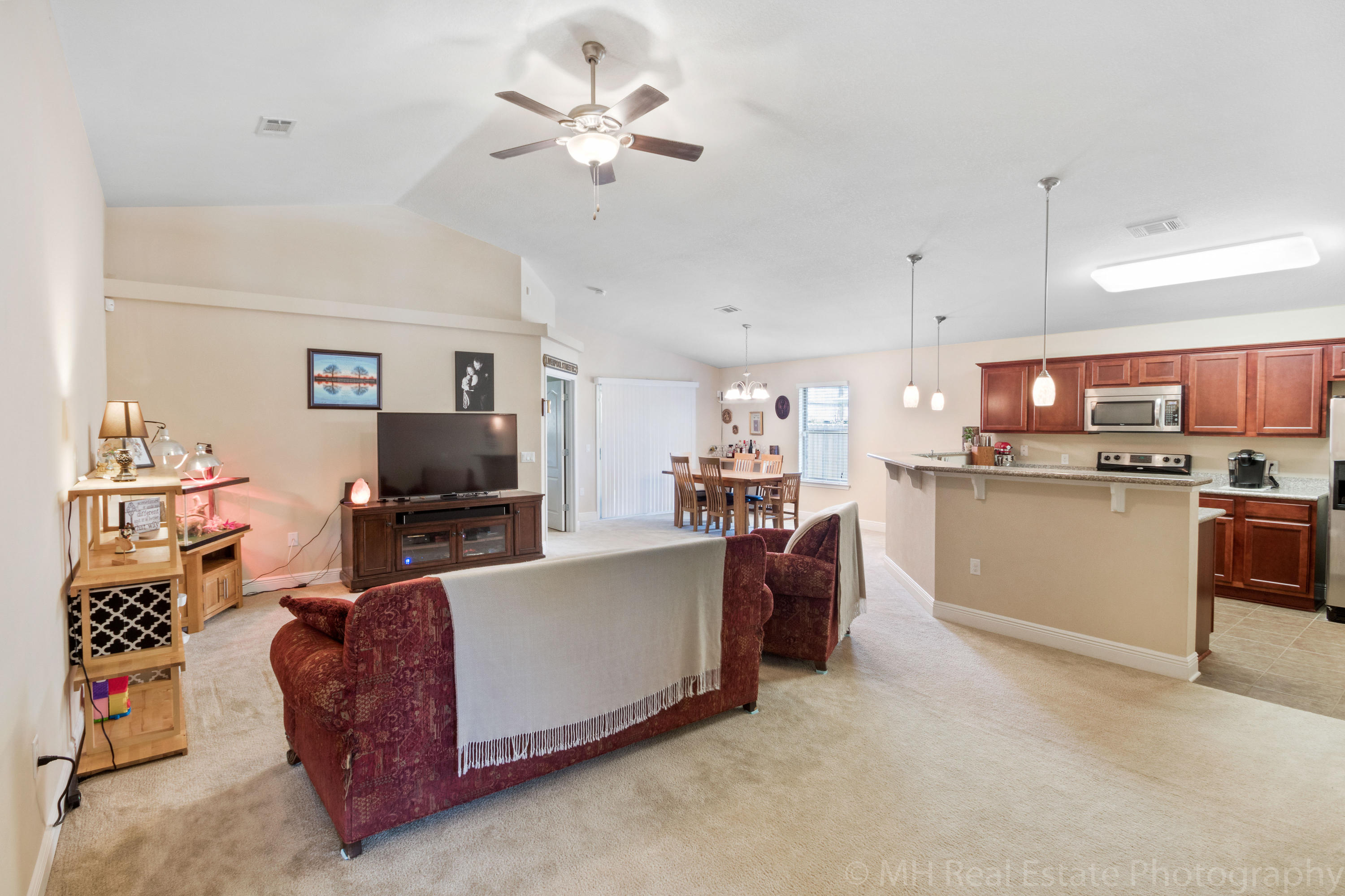 4541 Hermosa Road Crestview, FL 32539 - Photo 4 of 14 a living room with furniture and a flat screen tv