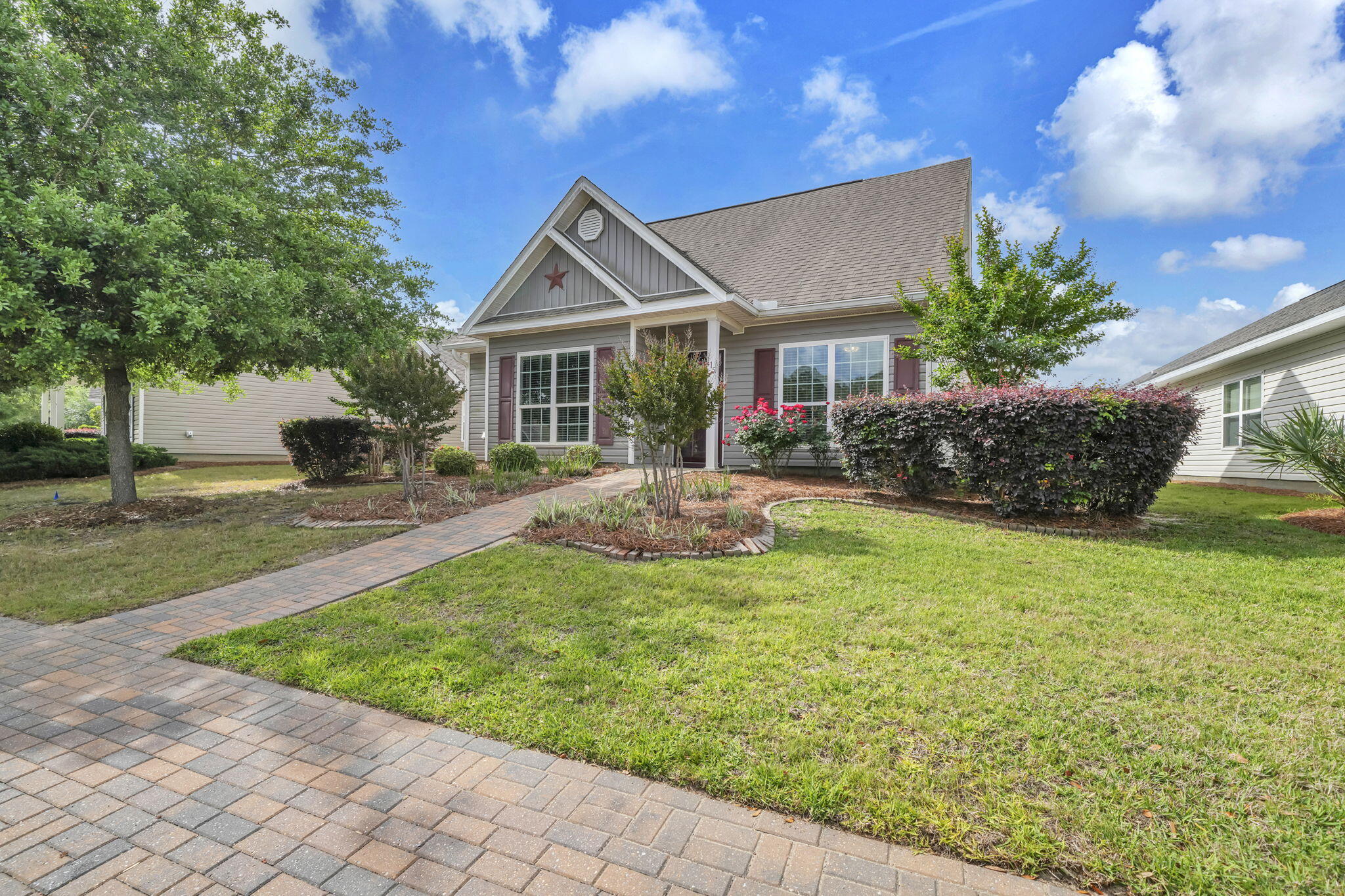 115 Lilly Bell Lane Freeport, FL 32439 - Photo 1 of 47 a view of a house with backyard and sitting area