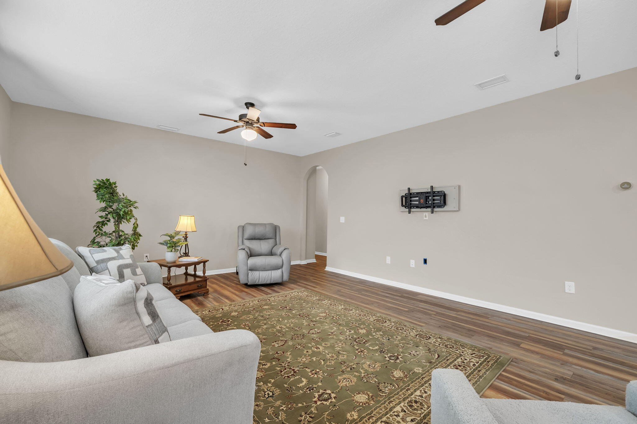 115 Lilly Bell Lane Freeport, FL 32439 - Photo 19 of 47 a living room with furniture and white walls