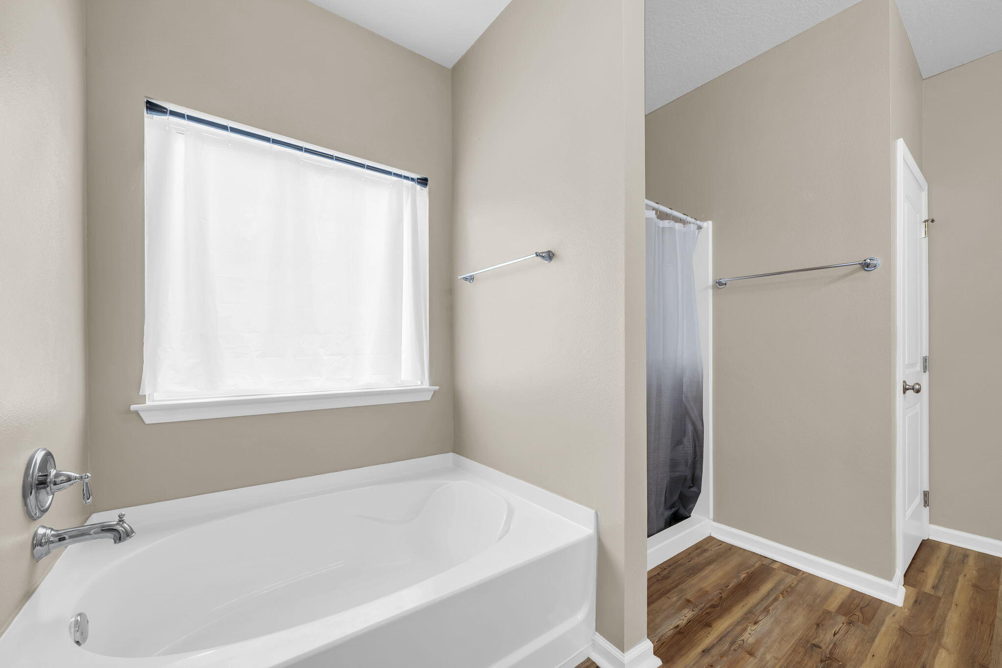 115 Lilly Bell Lane Freeport, FL 32439 - Photo 35 of 47 a white bath tub sitting next to a window