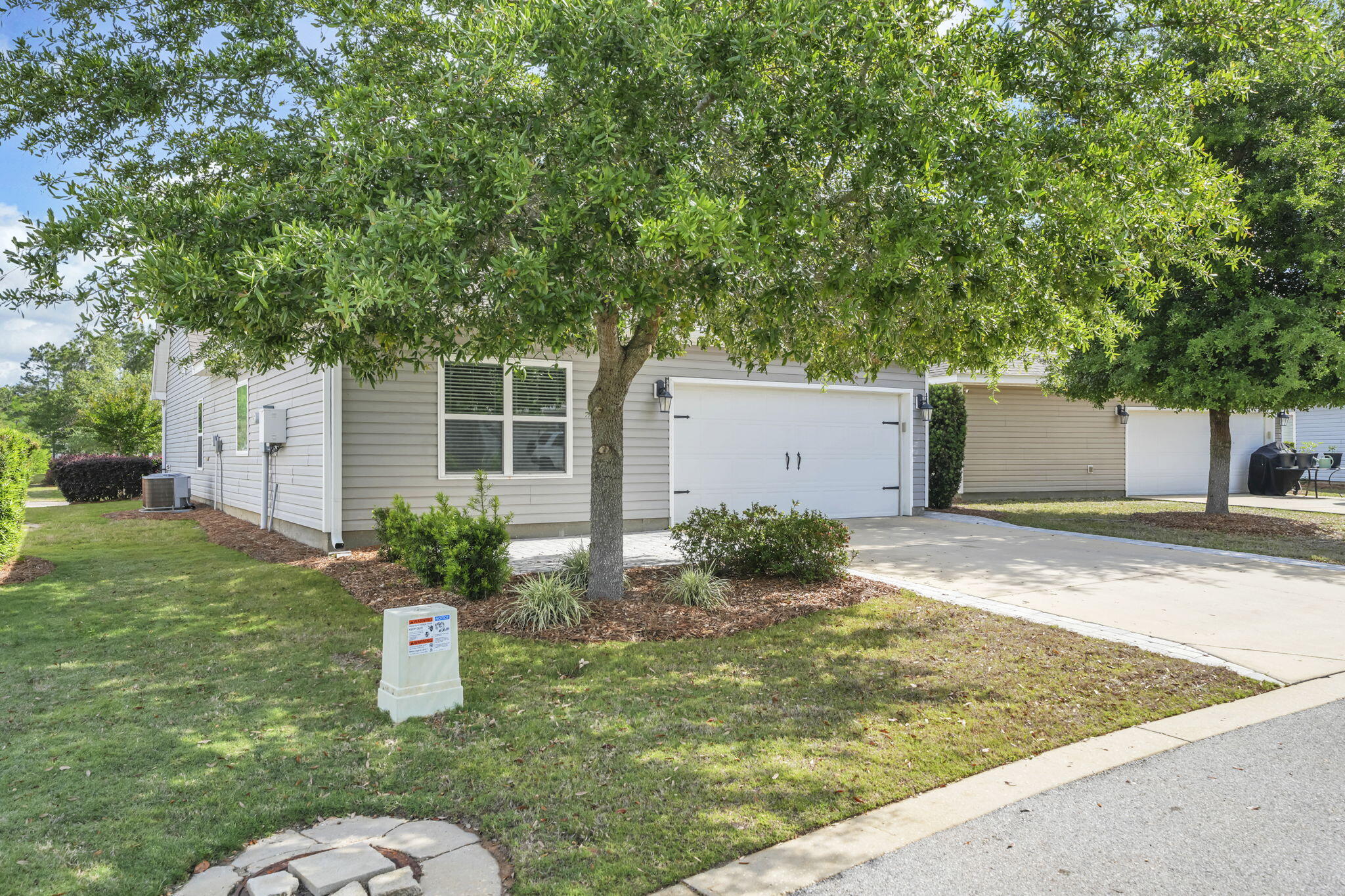 115 Lilly Bell Lane Freeport, FL 32439 - Photo 39 of 47 a house view with a backyard space