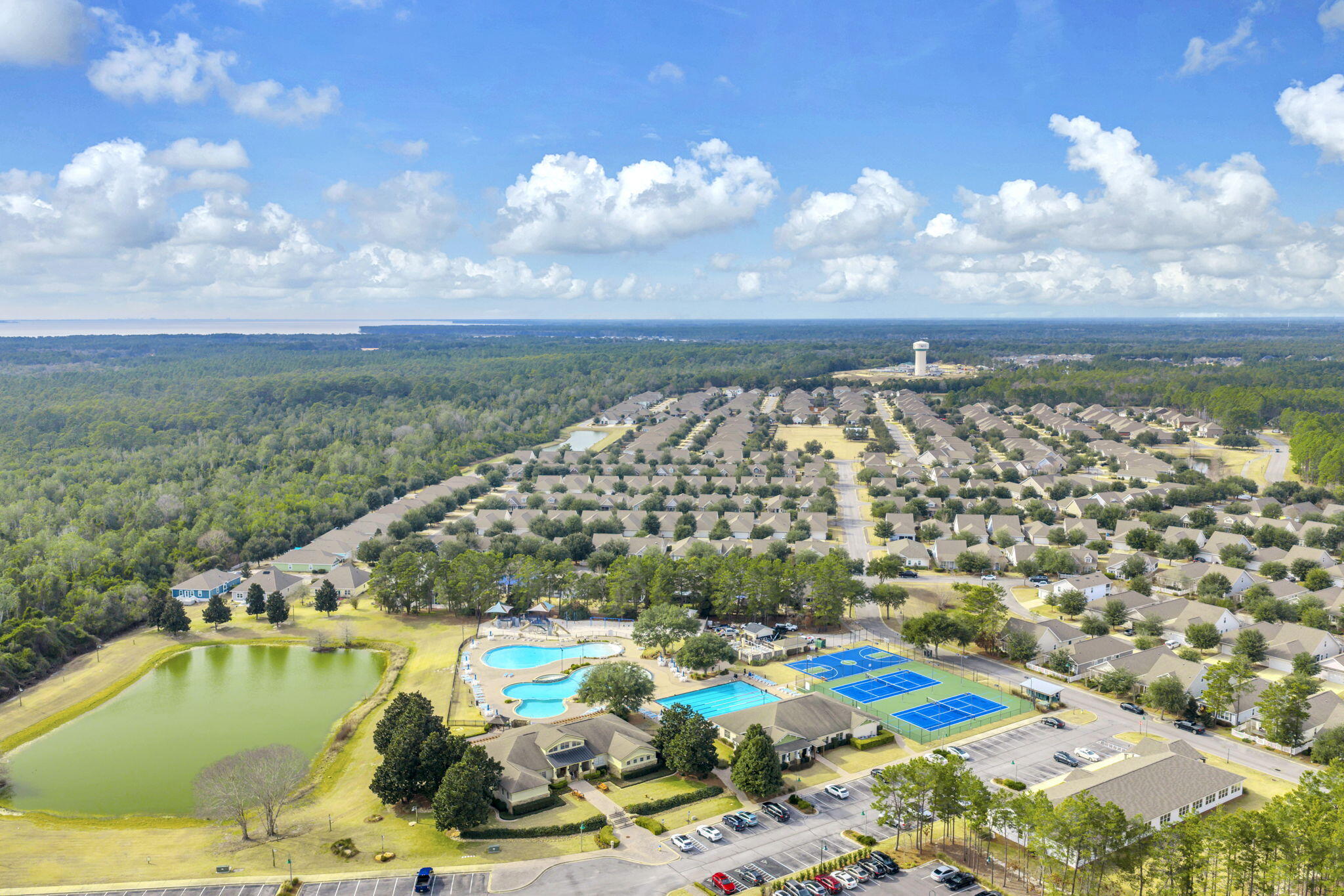 115 Lilly Bell Lane Freeport, FL 32439 - Photo 42 of 47 a view of a lake with a city