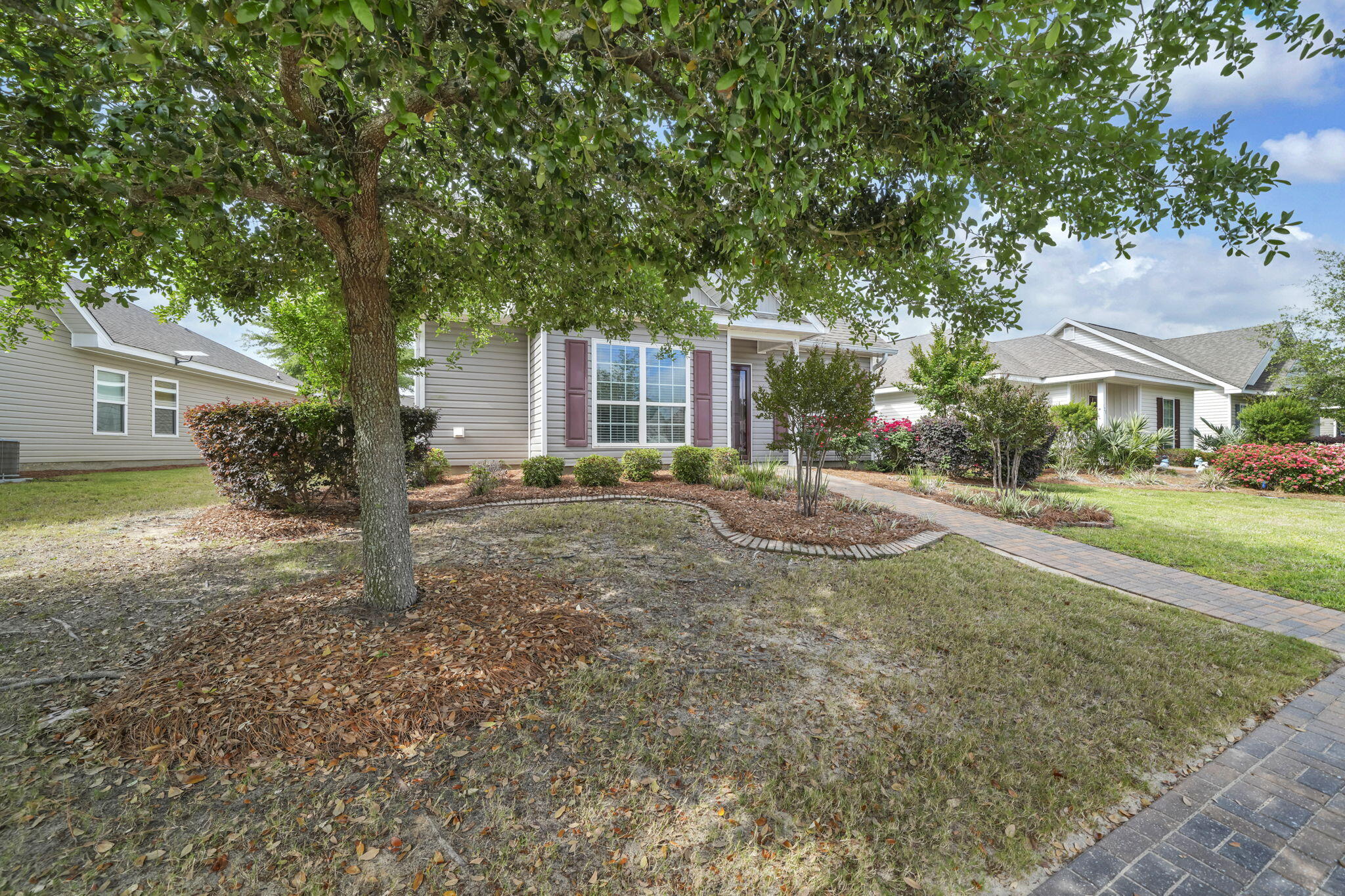 115 Lilly Bell Lane Freeport, FL 32439 - Photo 6 of 47 a view of a house with a yard