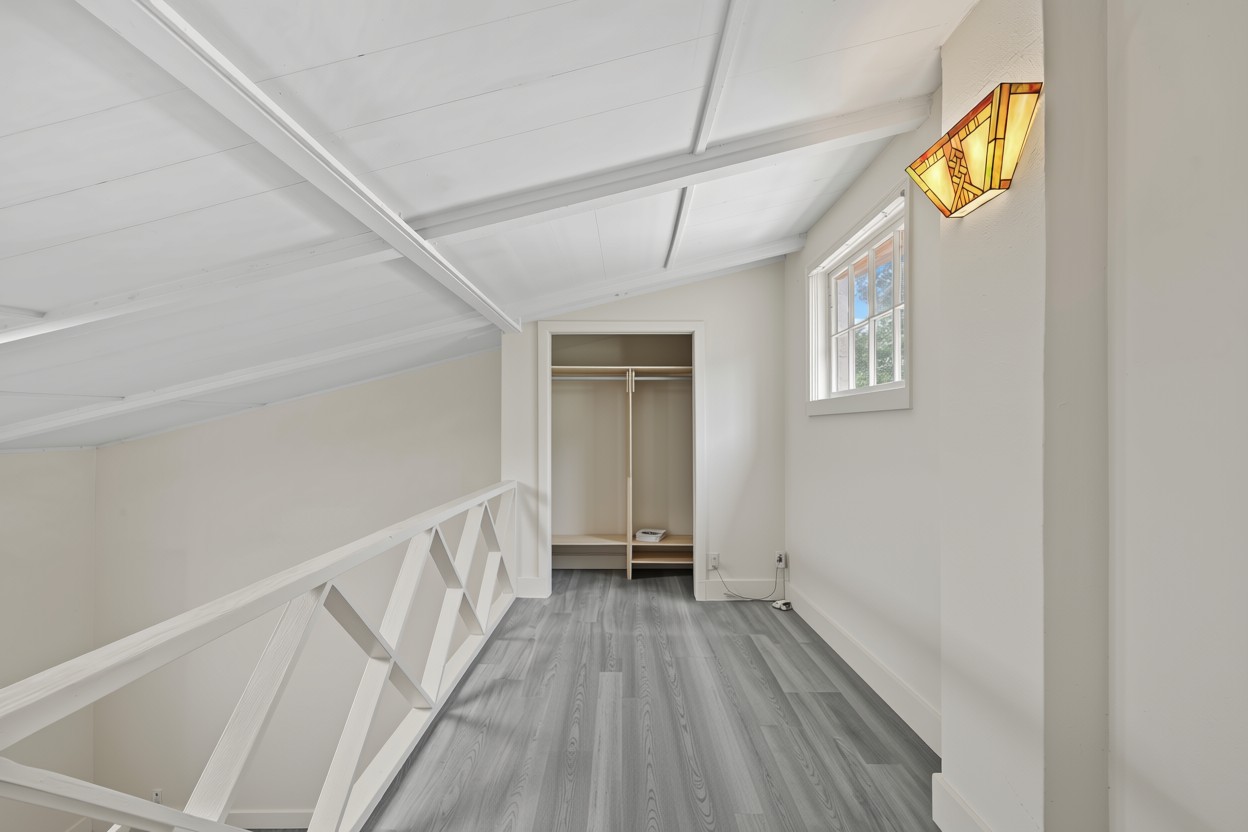 3302 Cherrywood Road Austin, TX 78722 - Photo 9 of 34 a view of a hallway view with wooden floor