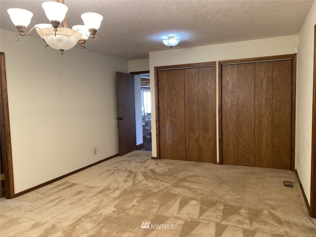 7419 Willow Grove Road Longview, WA 98632 - Photo 15 of 24 a view of an empty room with a window