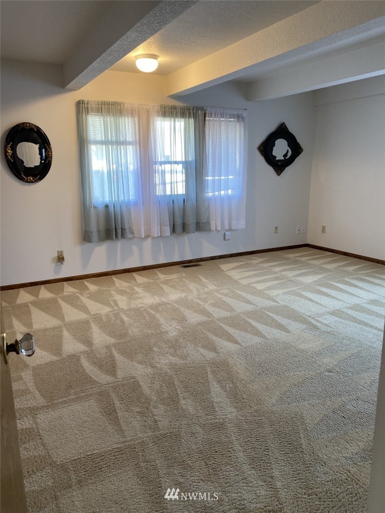 7419 Willow Grove Road Longview, WA 98632 - Photo 18 of 24 a view of an empty room with a window