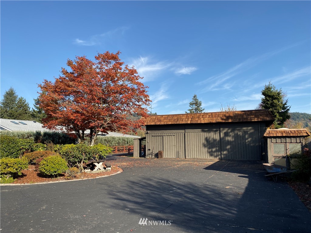 7419 Willow Grove Road Longview, WA 98632 - Photo 3 of 24 a view of a house with a patio