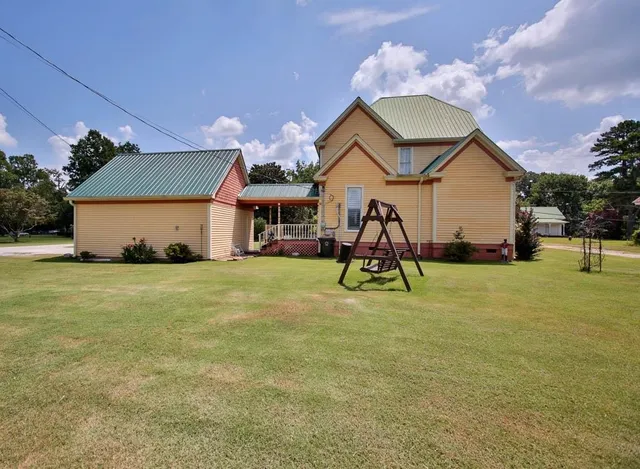 a view of a house with a swimming pool