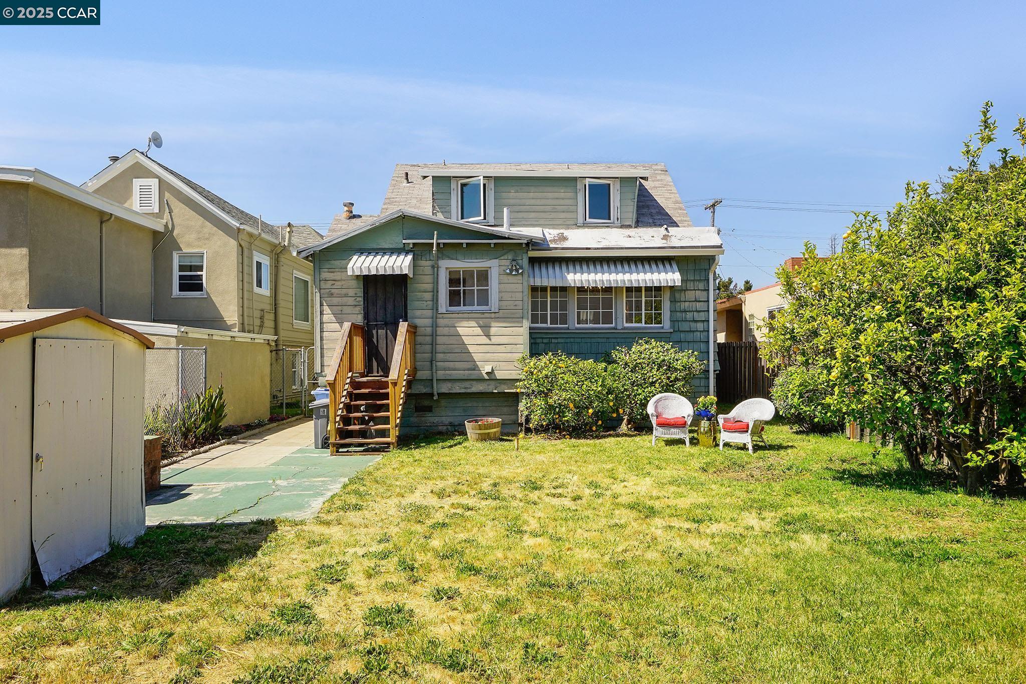 1322 Virginia Street Berkeley, CA 94702 - Photo 35 of 54 a view of a house with backyard