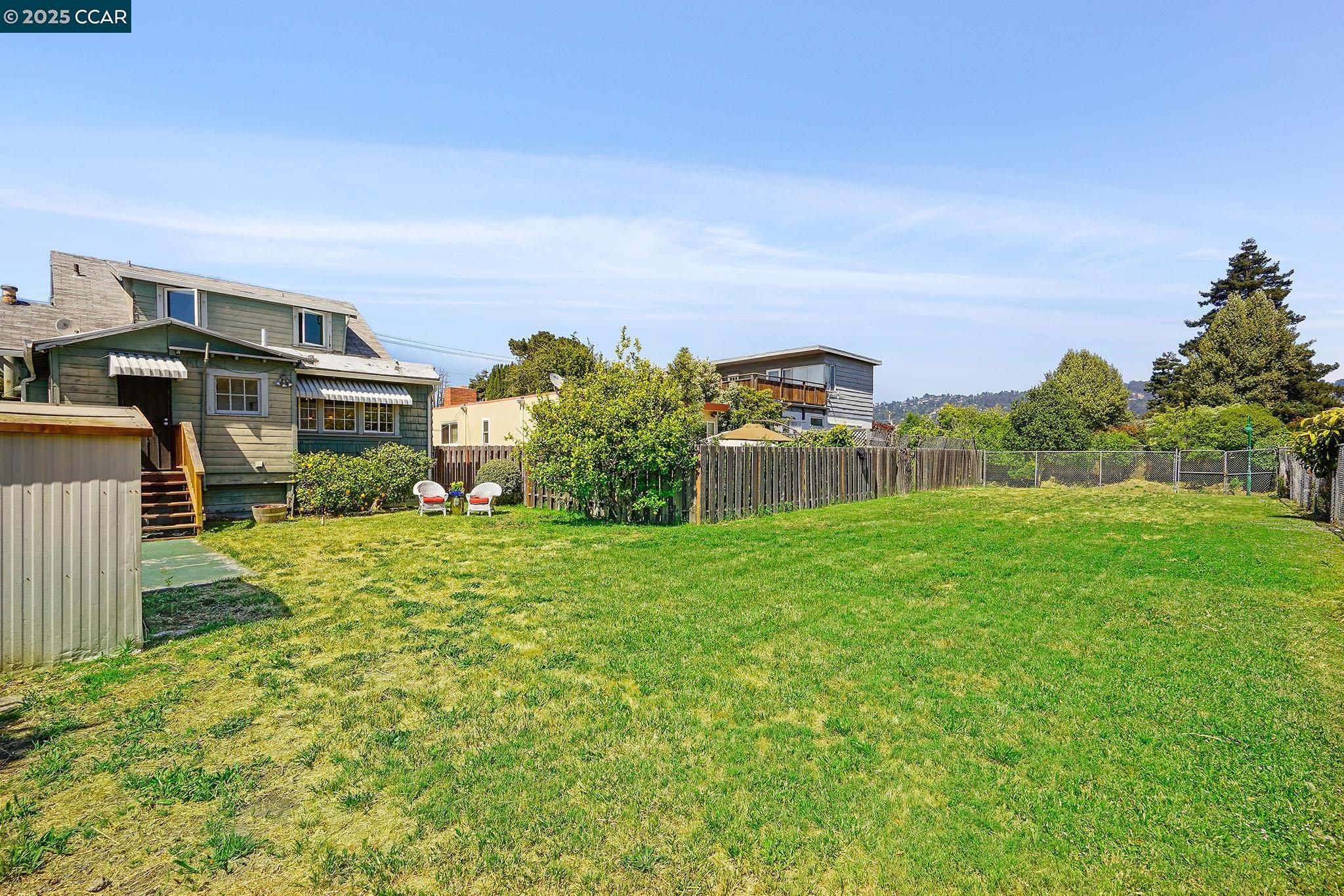 1322 Virginia Street Berkeley, CA 94702 - Photo 36 of 54 a view of a garden with a building in the background