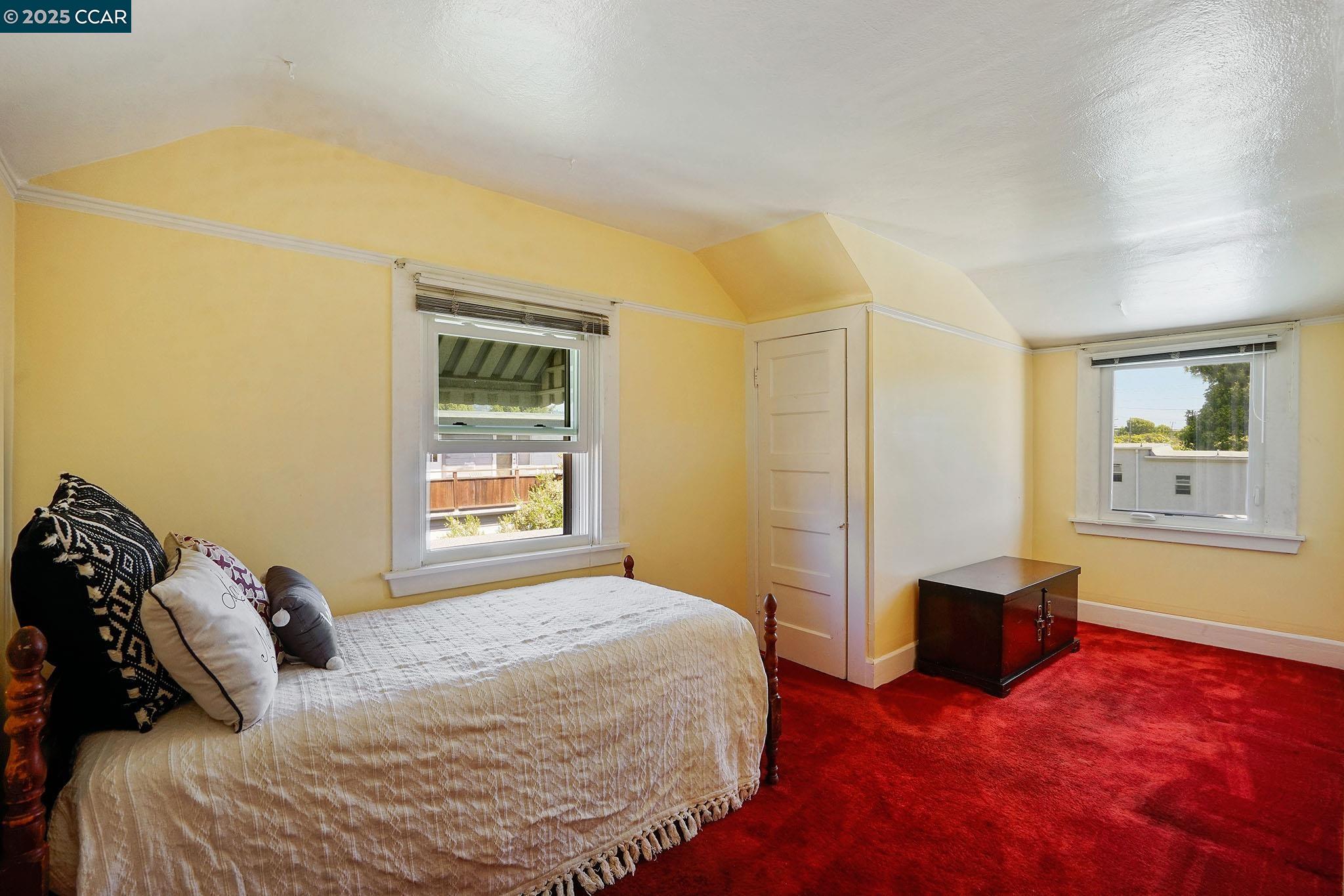 1322 Virginia Street Berkeley, CA 94702 - Photo 48 of 54 a bedroom with a bed and window