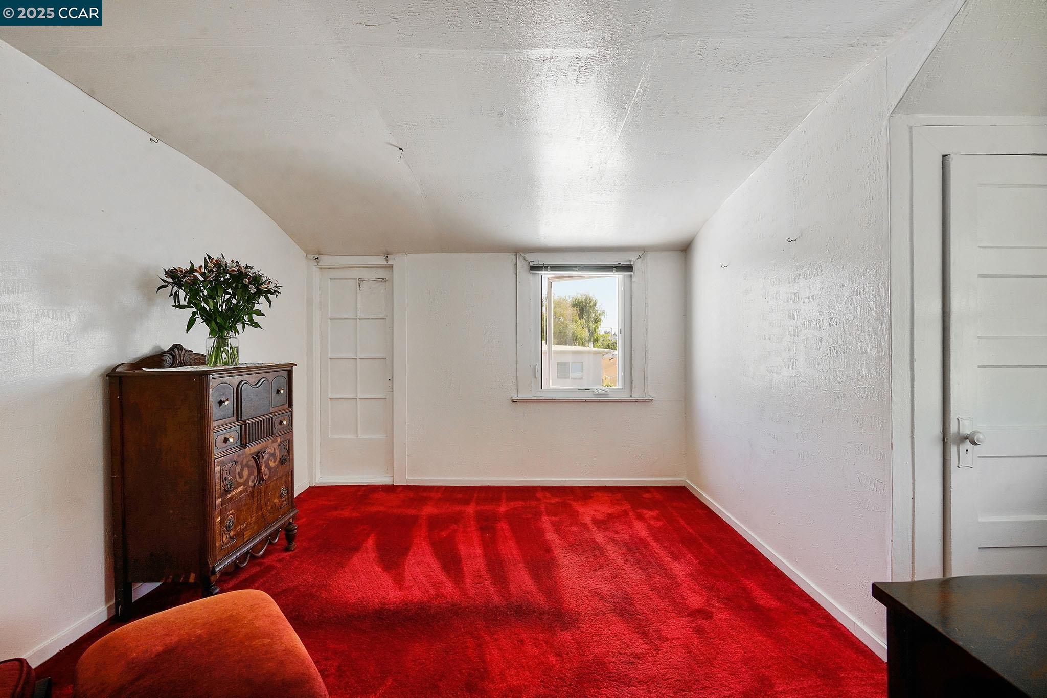 1322 Virginia Street Berkeley, CA 94702 - Photo 49 of 54 a bed room with a bed and a potted plant