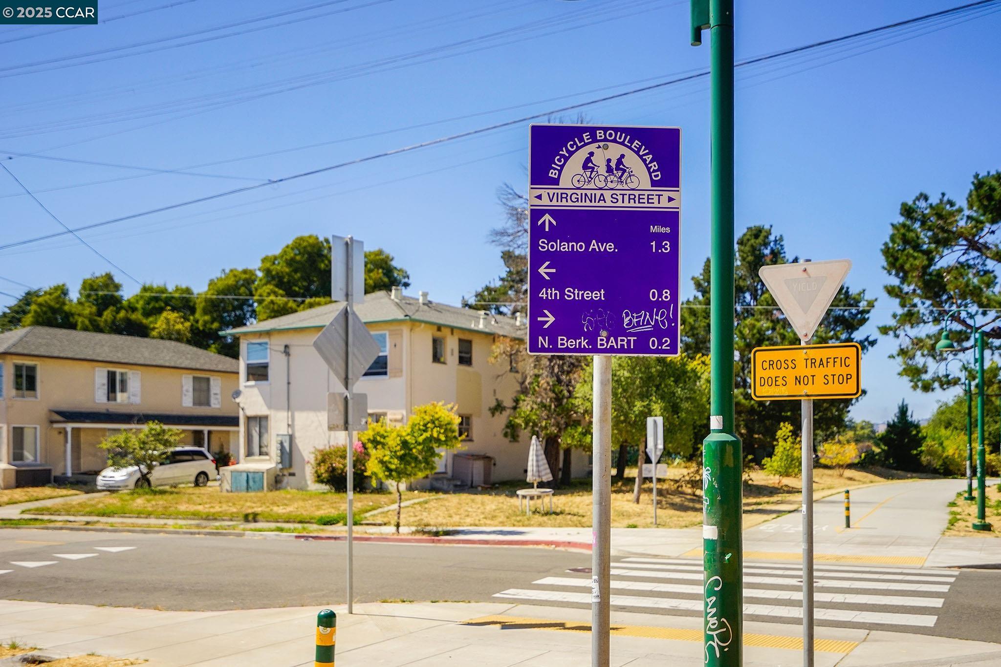 1322 Virginia Street Berkeley, CA 94702 - Photo 53 of 54 a view of a street with a building and trees in the background