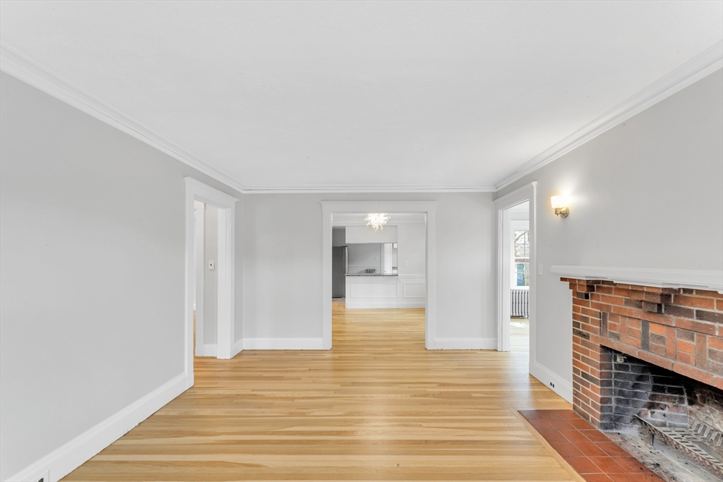 21-23 Richards Road, Unit 21 Watertown, MA 02472 - Photo 12 of 28 a view of empty room with wooden floor