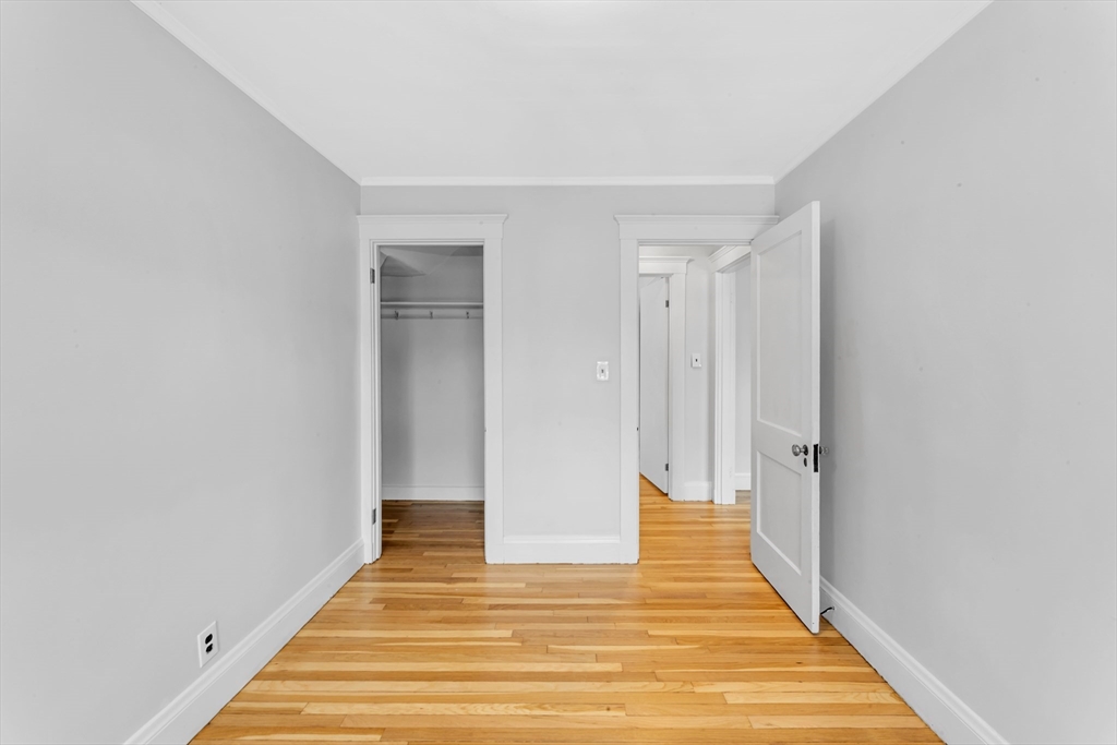 21-23 Richards Road, Unit 21 Watertown, MA 02472 - Photo 23 of 28 a view of a room with wooden floor