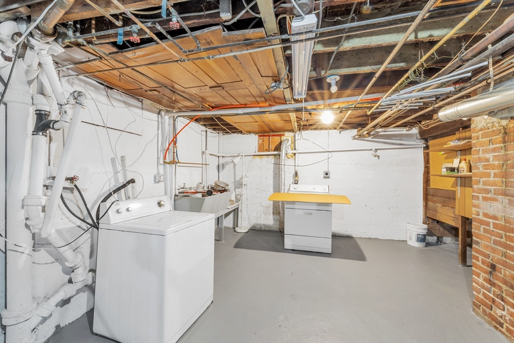 21-23 Richards Road, Unit 21 Watertown, MA 02472 - Photo 28 of 28 a utility room with dryer and washer