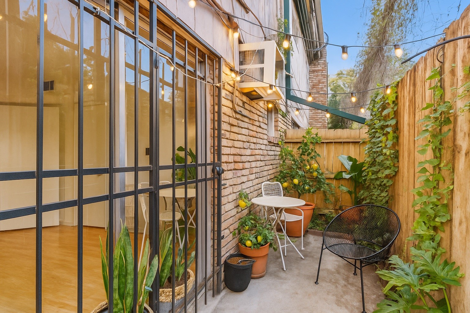 1849 Marshall Street, Unit 9 Houston, TX 77098 - Photo 19 of 25 Patio Area - Virtually Staged, Enhanced Photo