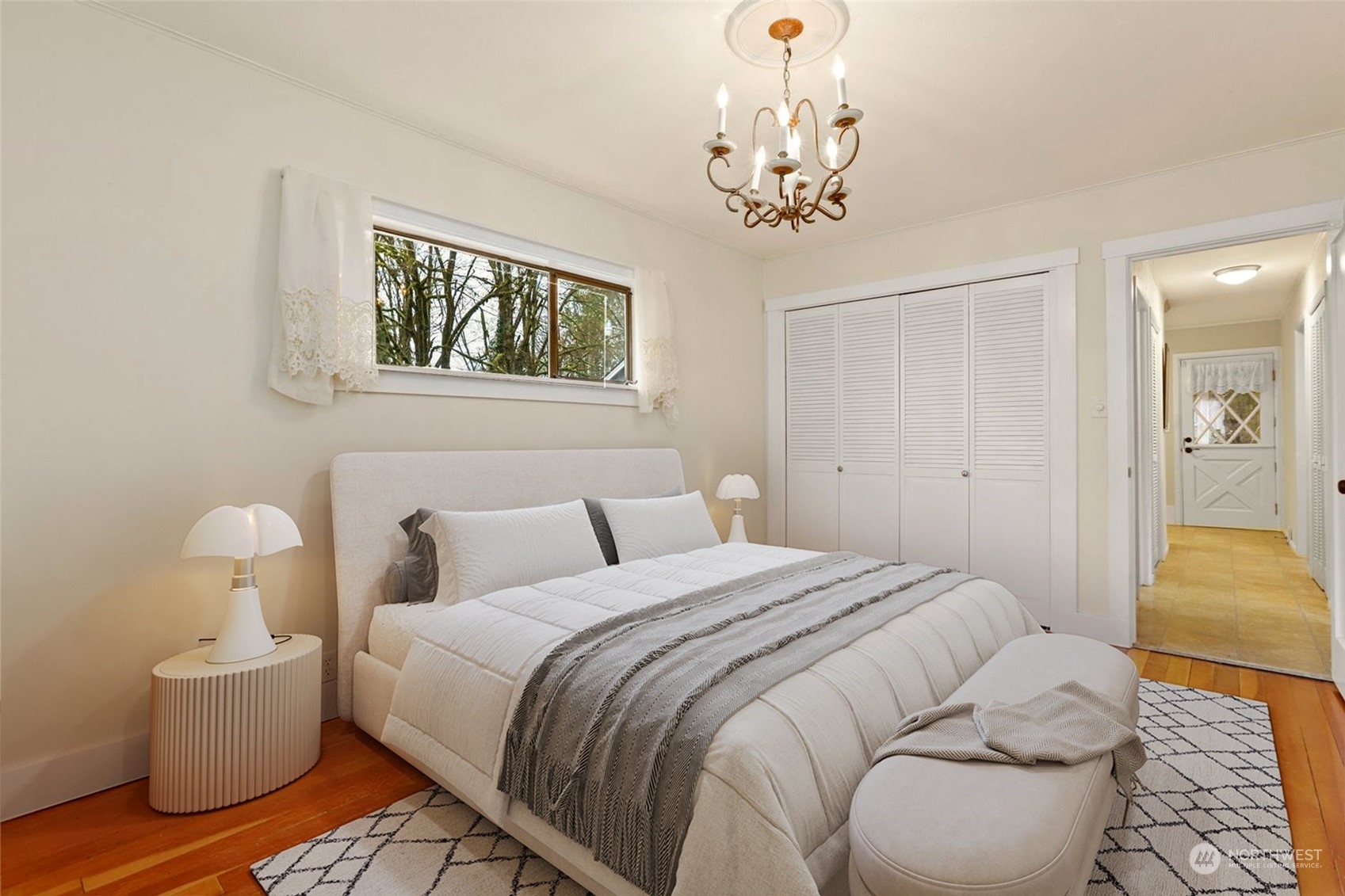 8500 Robe Menzel Road Granite Falls, WA 98252 - Photo 8 of 40 a bedroom with bed and a chandelier