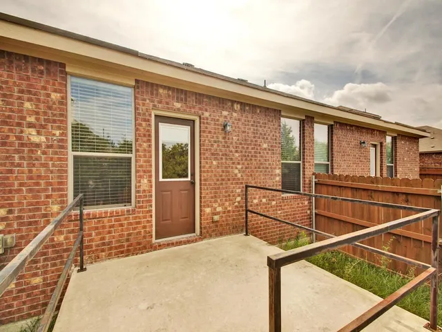 a view of a house with a large window