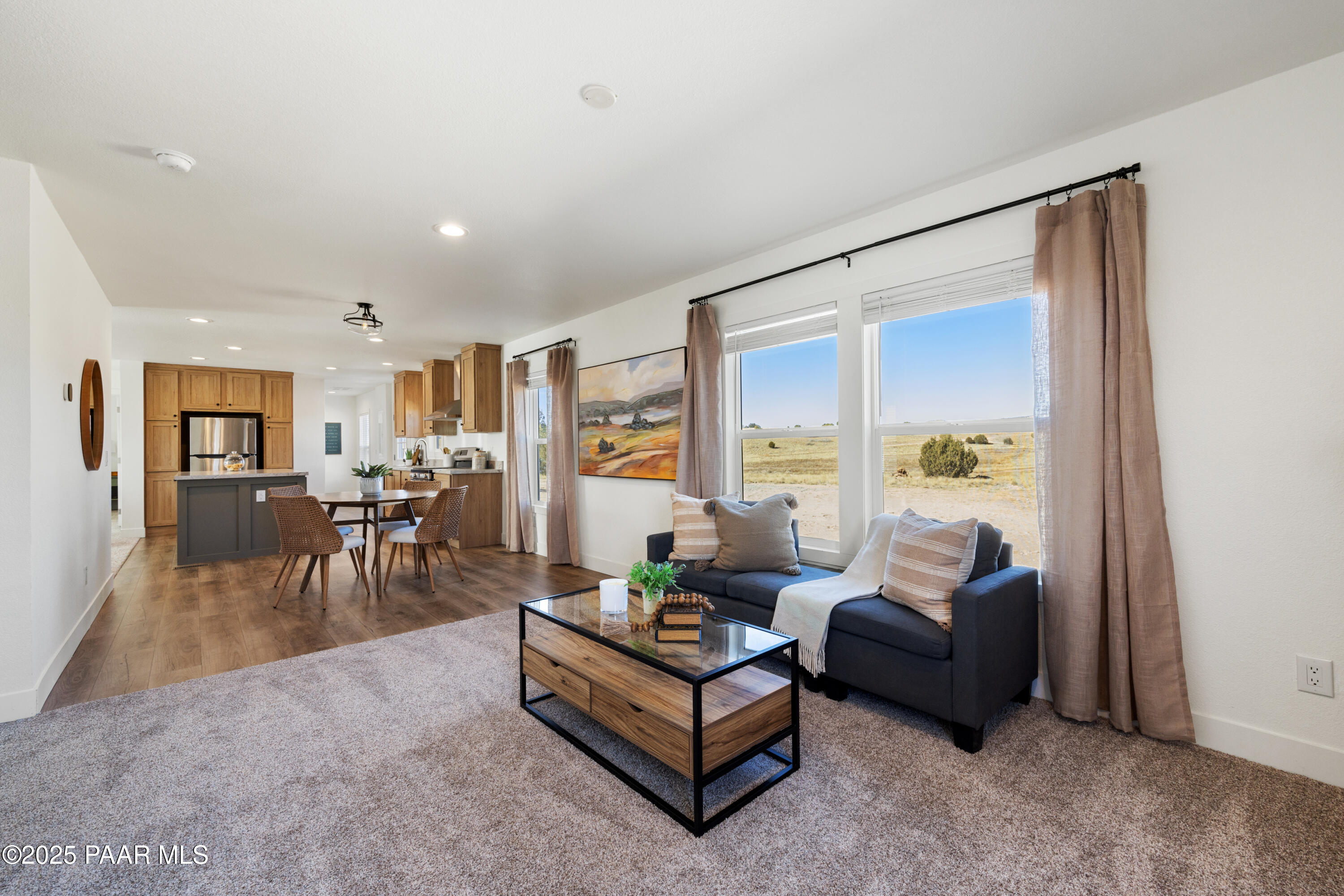320 East Abra Road Paulden, AZ 86334 - Photo 17 of 28 a living room with furniture and a table