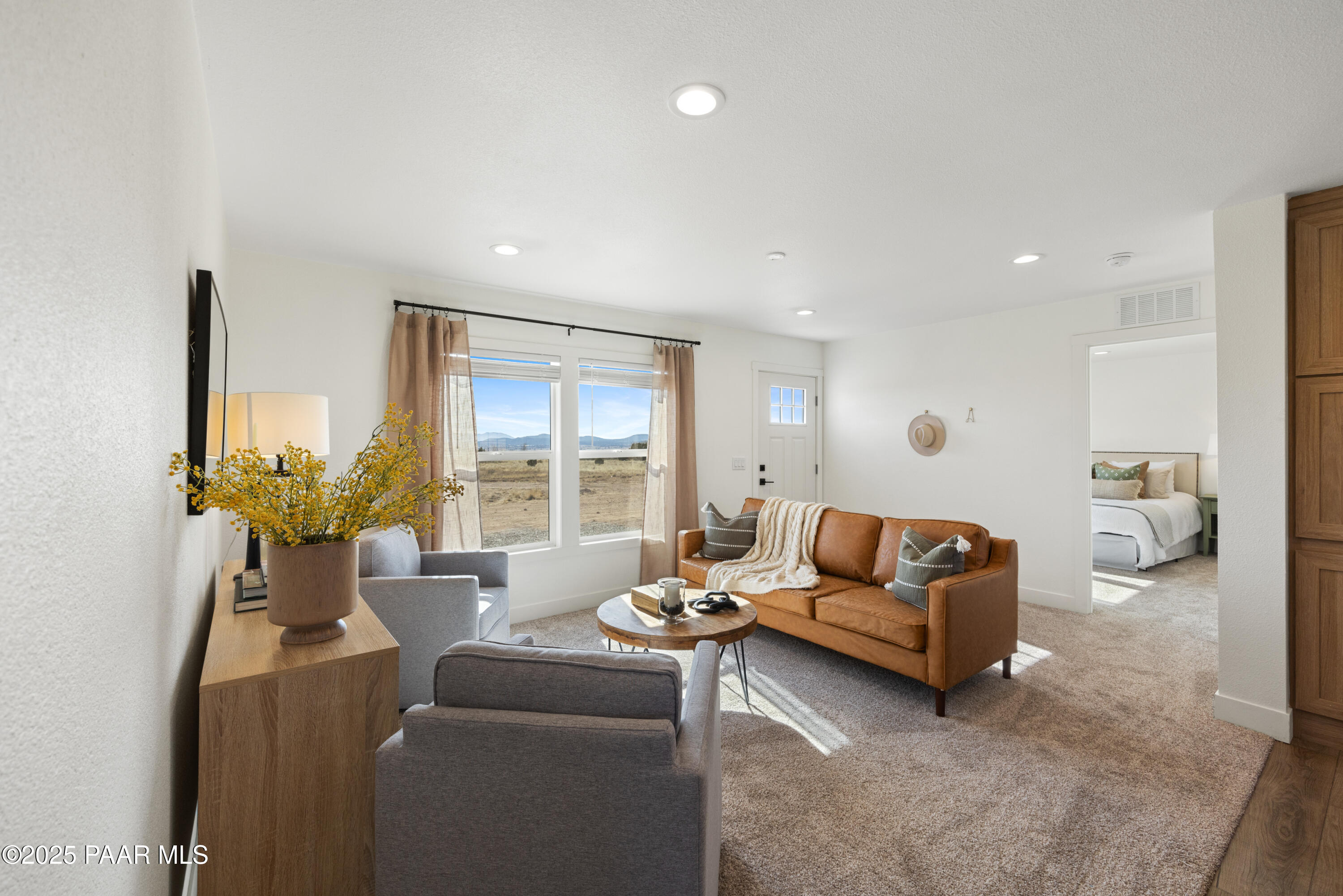 320 East Abra Road Paulden, AZ 86334 - Photo 5 of 28 a living room with furniture and a large window