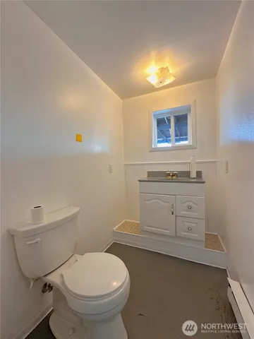 a bathroom with a sink and cabinets