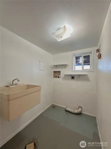 a room with furniture and window