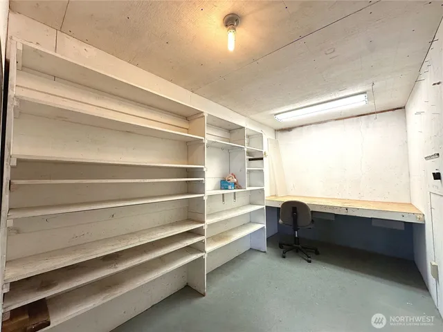 a view of a room with wooden walls