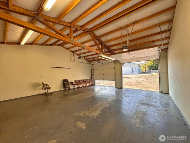 a view of a swimming pool with an outdoor space and seating area