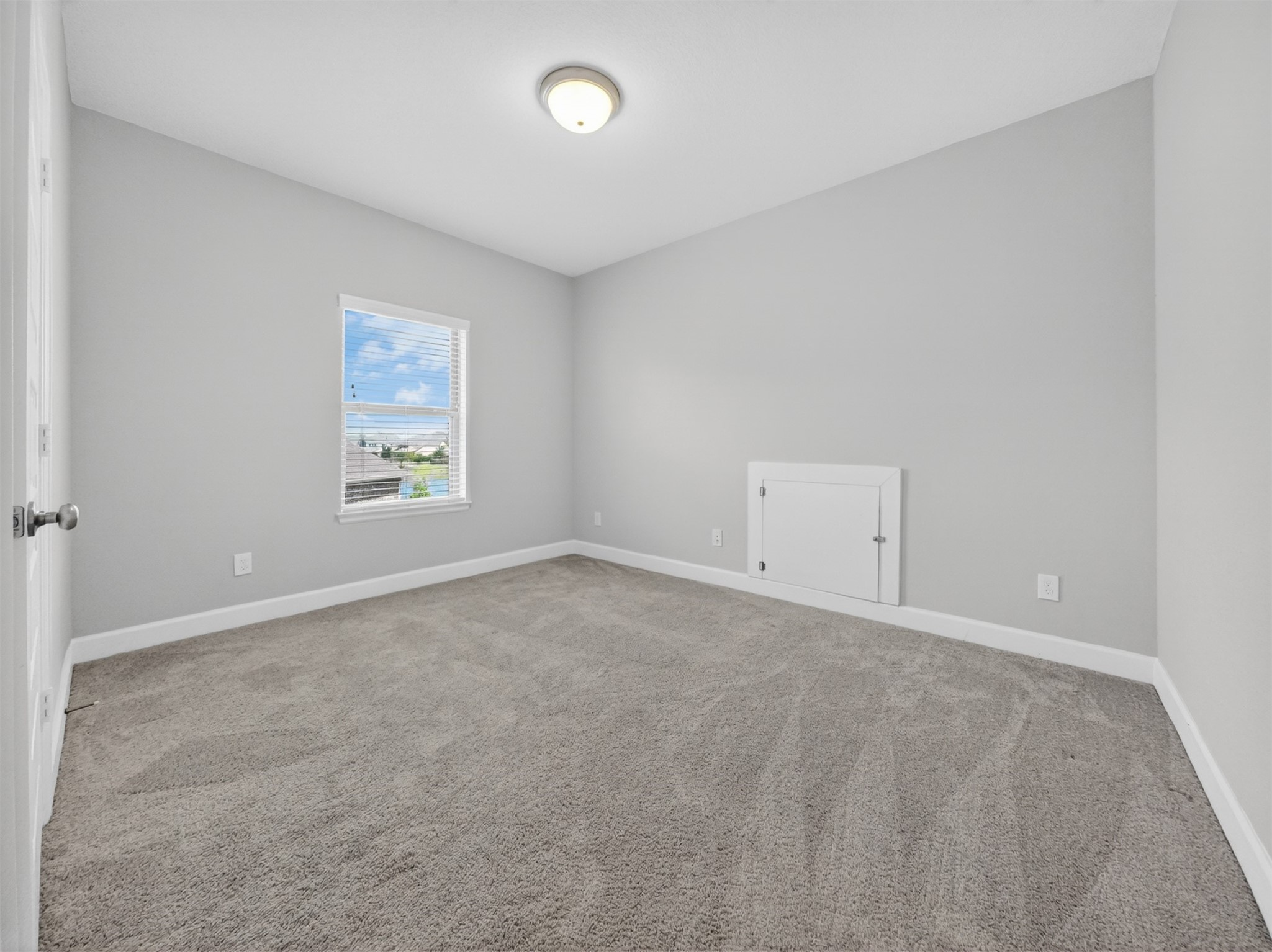 4343 Martin Ridge Drive Manvel, TX 77578 - Photo 34 of 50 an empty room with a window