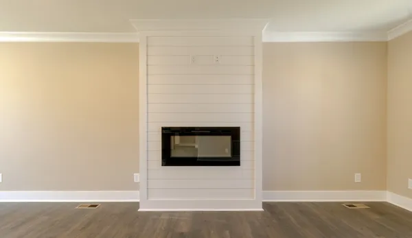 a living room with a fireplace