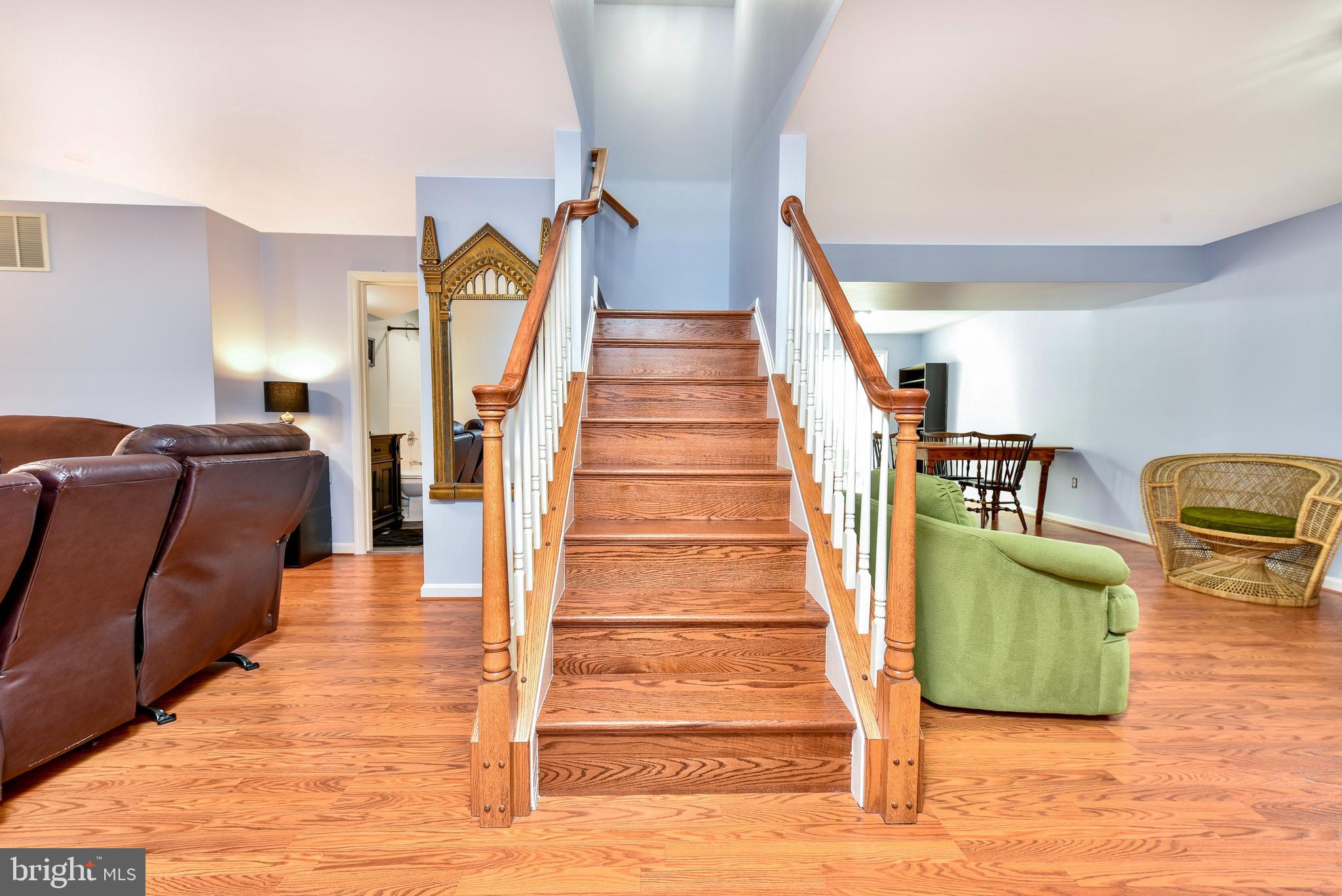 21297 Mirror Ridge Place Sterling, VA 20164 - Photo 22 of 44 HARDWOOD STAIRS