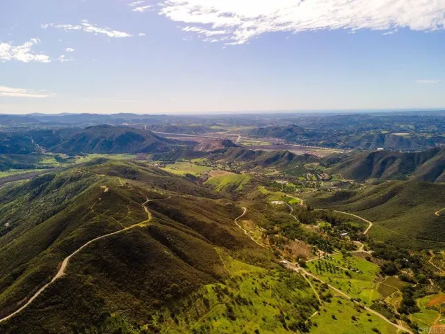 a view of an ocean and a mountain
