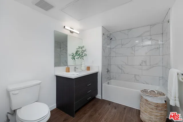 a view of a bedroom from the hallway