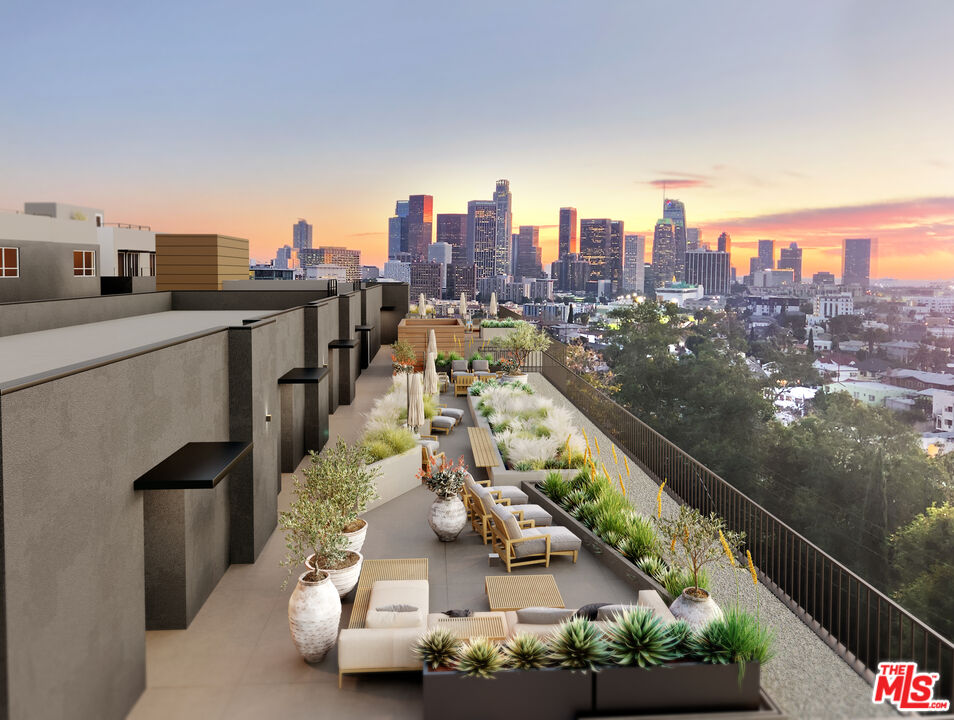 1011 Everett Street, Unit A201 Los Angeles, CA 90026 - Photo 2 of 17 a city view with tall buildings