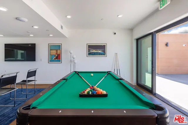 a view of a terrace with furniture