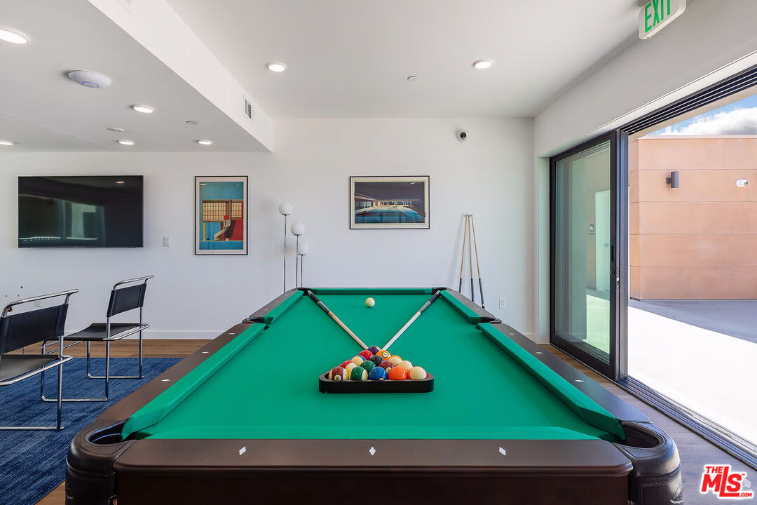 1011 Everett Street, Unit A201 Los Angeles, CA 90026 - Photo 8 of 17 a room with games and windows