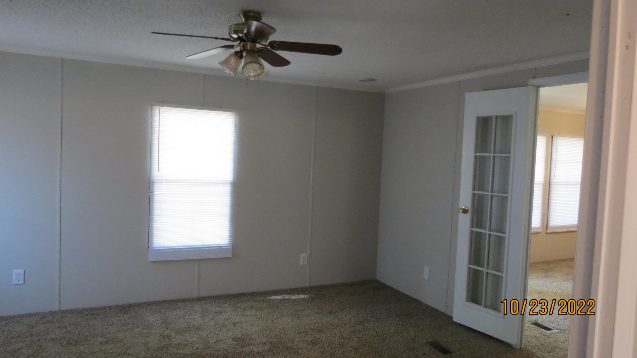 2046 Old Snow Hill Road Dowelltown, TN 37059 - Photo 17 of 34 an empty room with windows and fan