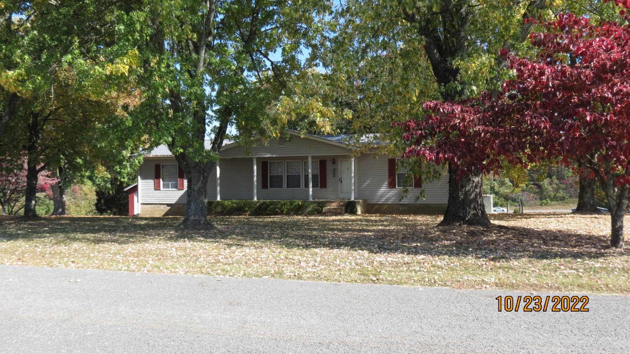 2046 Old Snow Hill Road Dowelltown, TN 37059 - Photo 2 of 34 a front view of a house with a tree