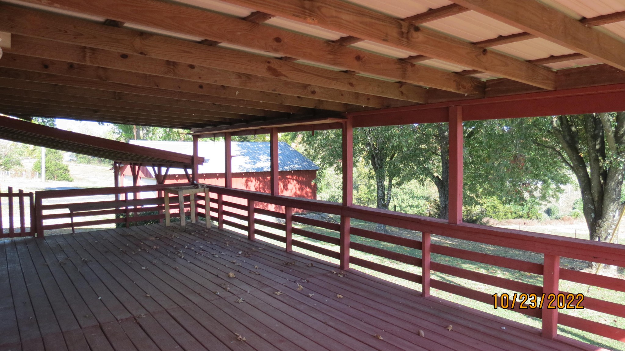 2046 Old Snow Hill Road Dowelltown, TN 37059 - Photo 28 of 34 a view of outdoor space with wooden floor and outdoor seating
