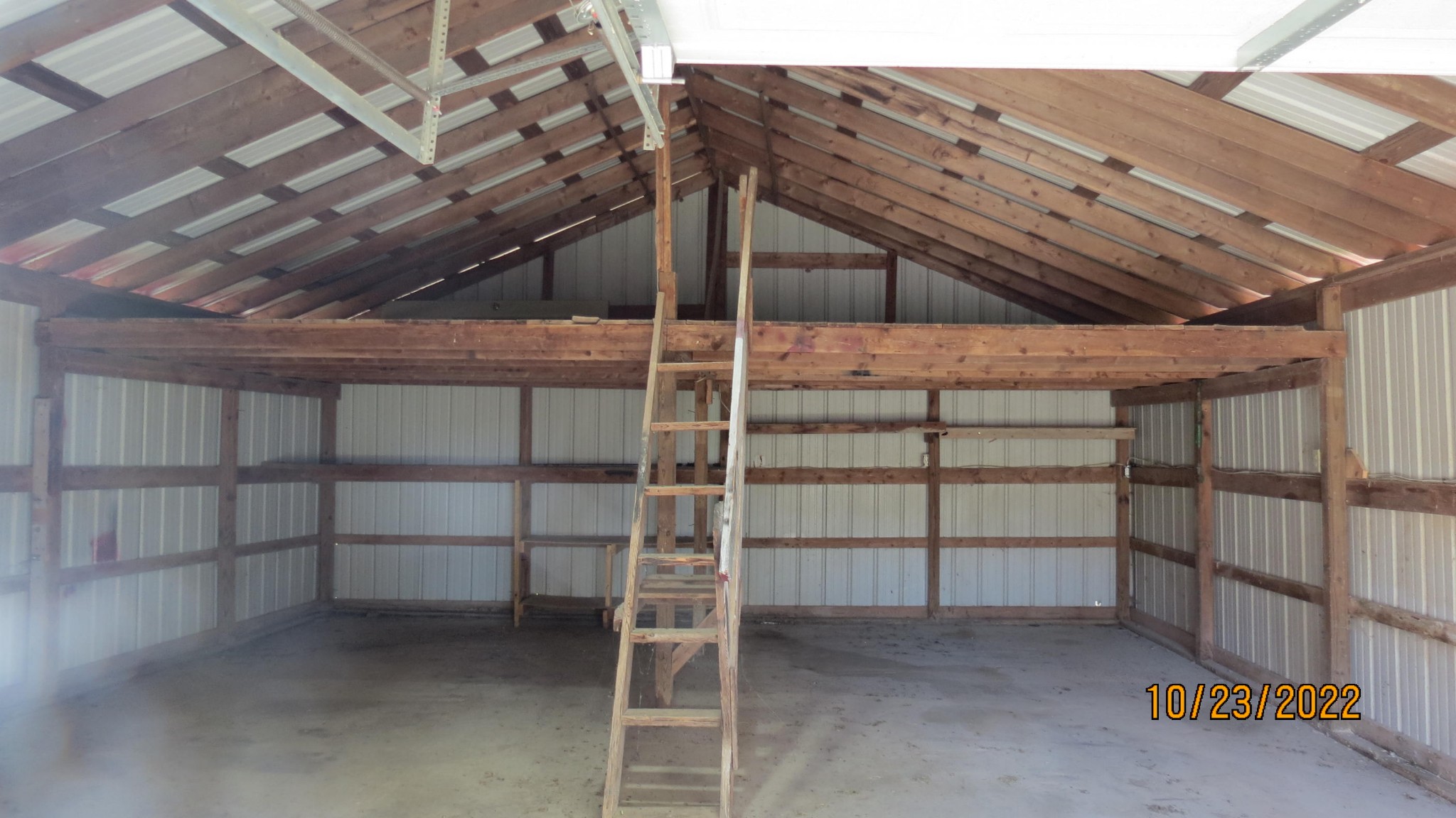 2046 Old Snow Hill Road Dowelltown, TN 37059 - Photo 33 of 34 a view of an empty room with racks