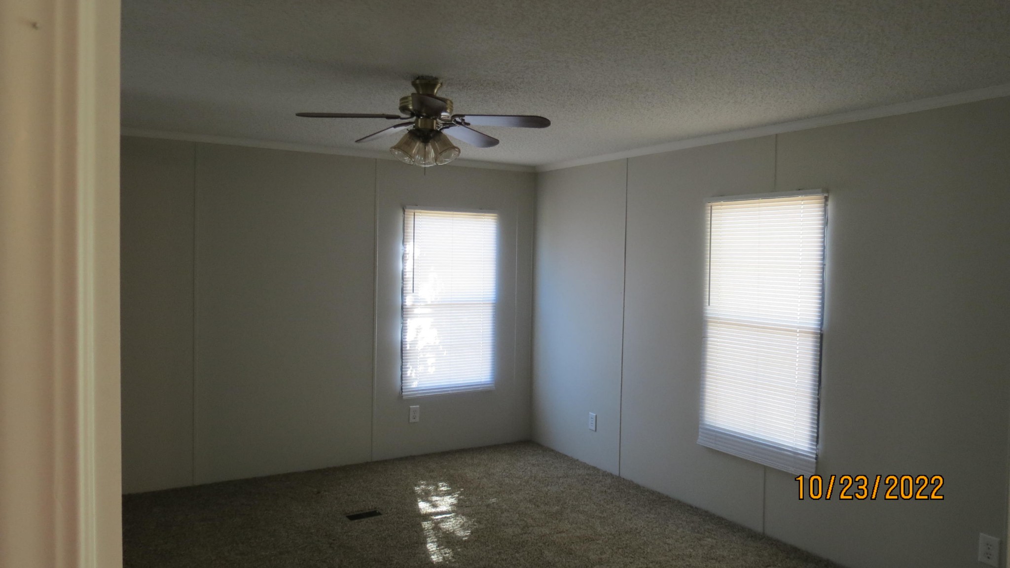 2046 Old Snow Hill Road Dowelltown, TN 37059 - Photo 9 of 34 an empty room with windows and fan