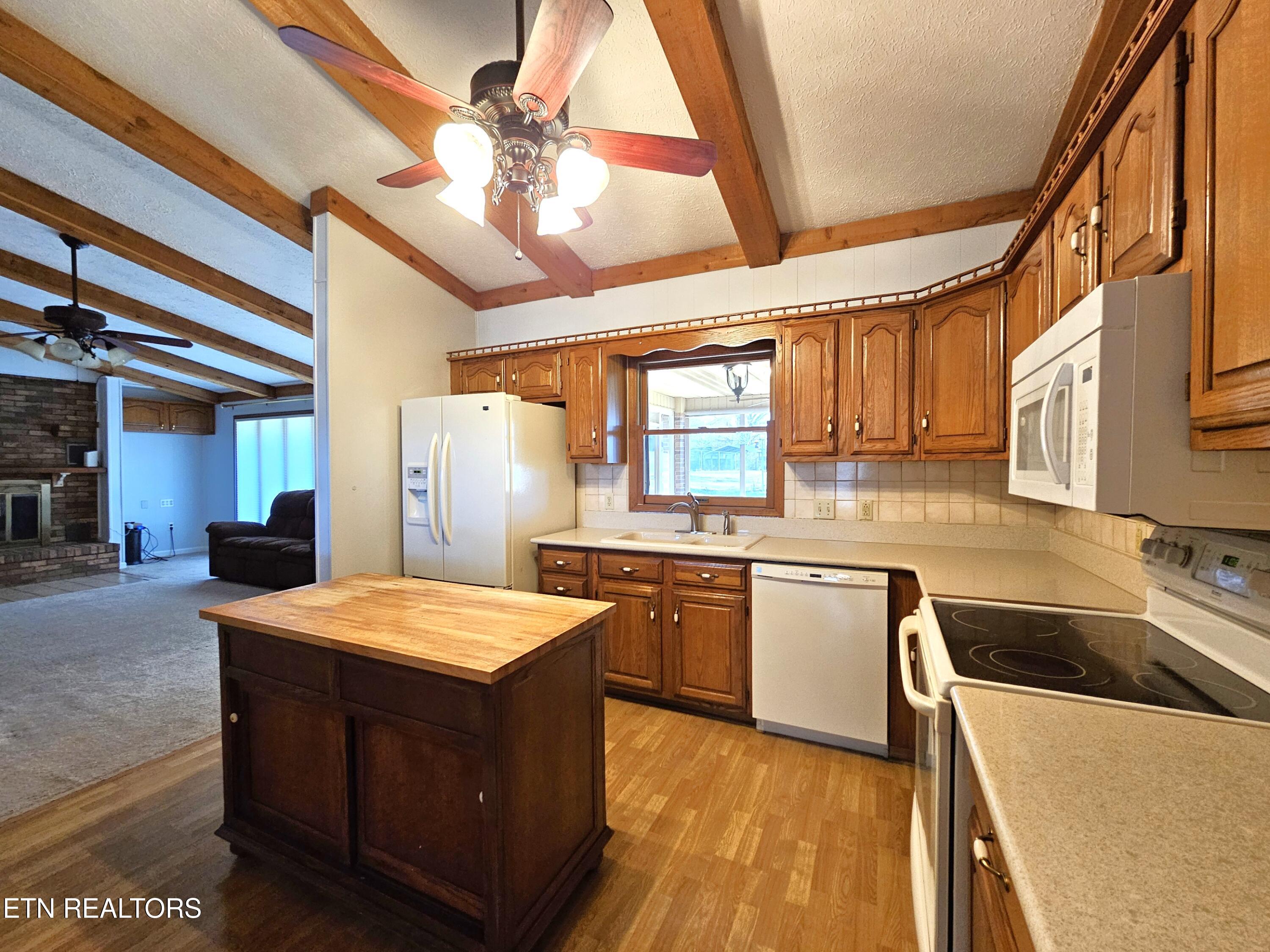 9430 North Ruggles Ferry Pike Strawberry Plains, TN 37871 - Photo 11 of 27 Kitchen view toward backyard