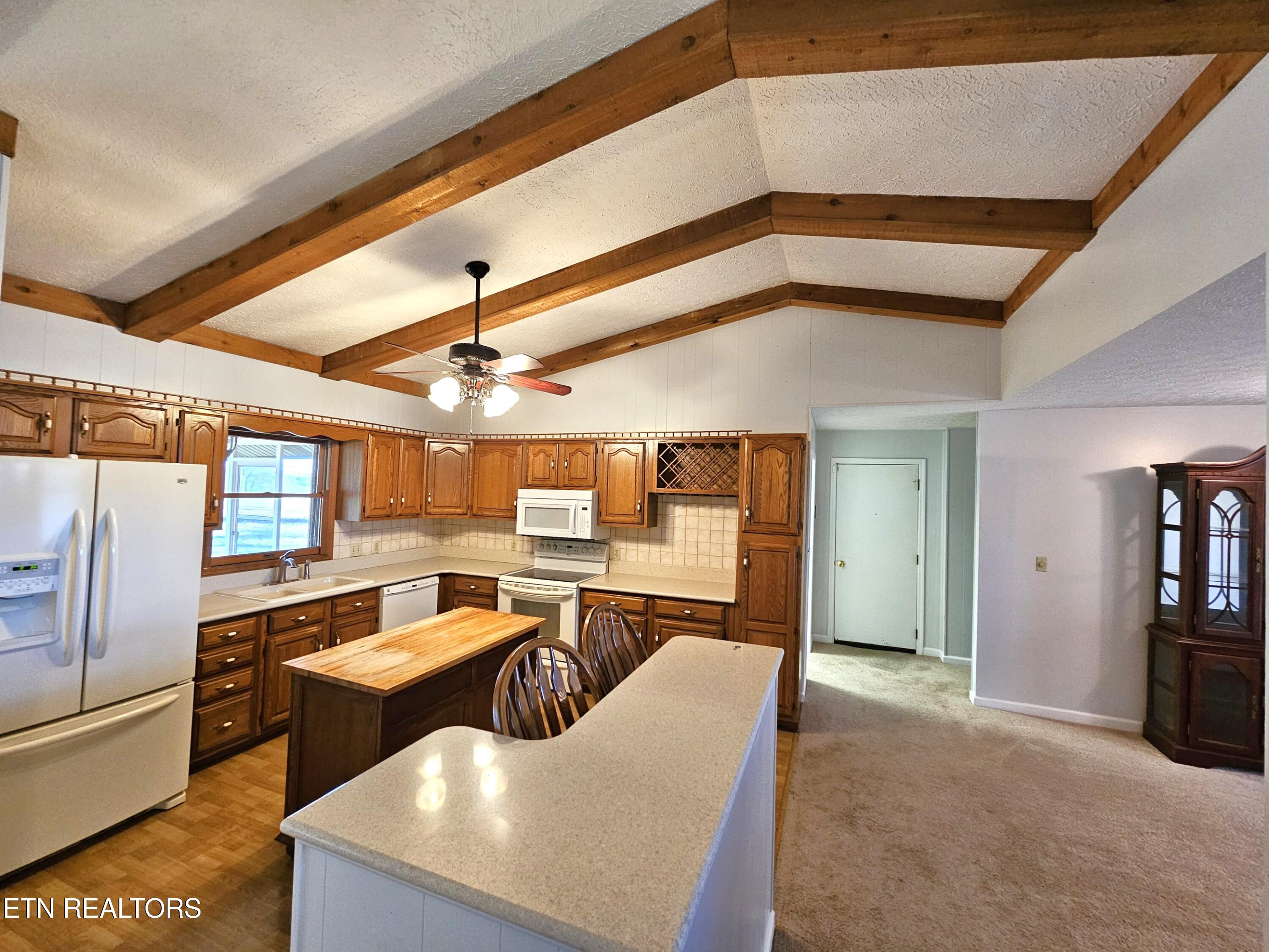 9430 North Ruggles Ferry Pike Strawberry Plains, TN 37871 - Photo 12 of 27 Ruggles Ferry view from bar into kitchen