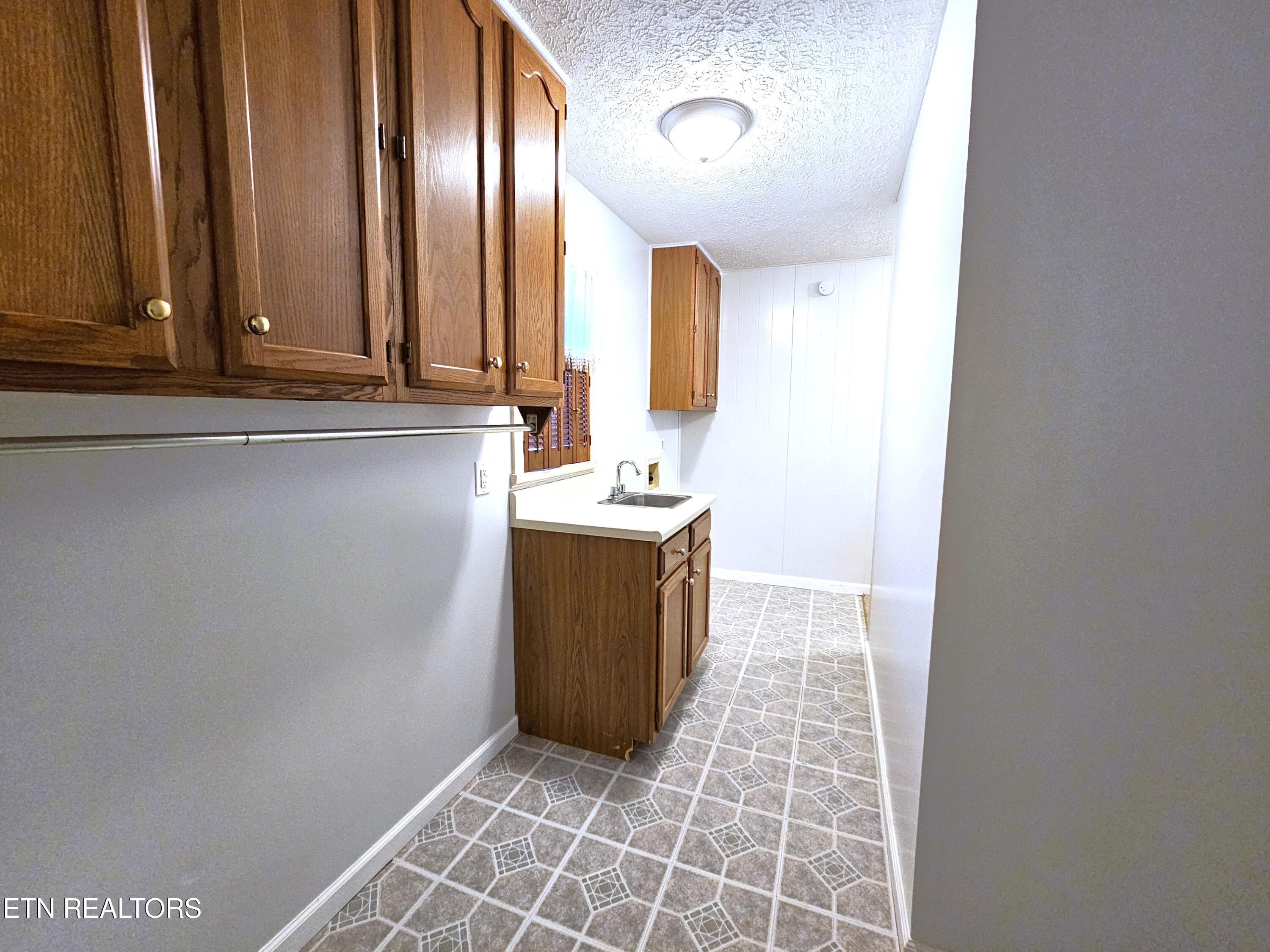 9430 North Ruggles Ferry Pike Strawberry Plains, TN 37871 - Photo 21 of 27 Spacious laundry room