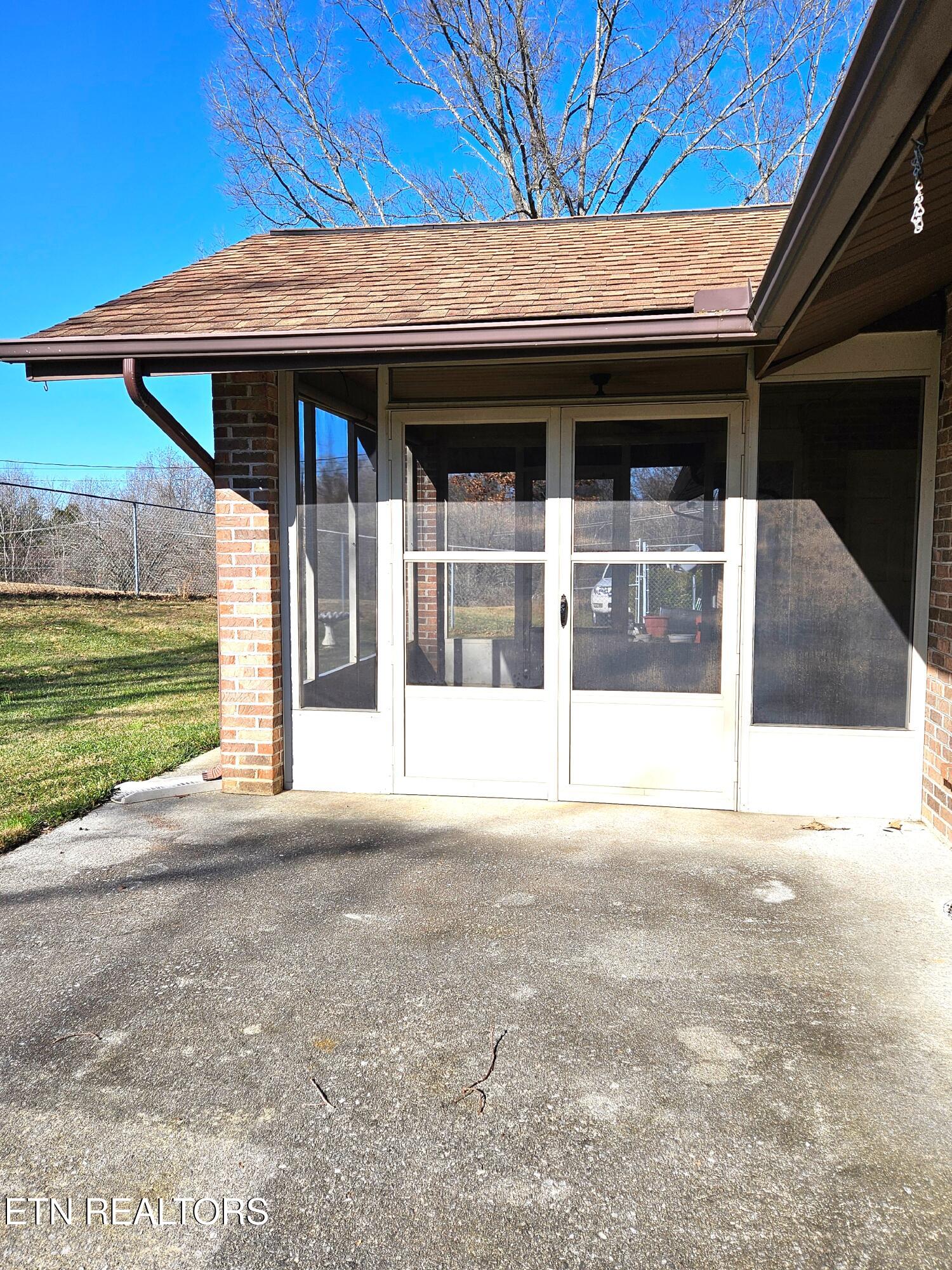 9430 North Ruggles Ferry Pike Strawberry Plains, TN 37871 - Photo 26 of 27 Exterior entrance to screened porch