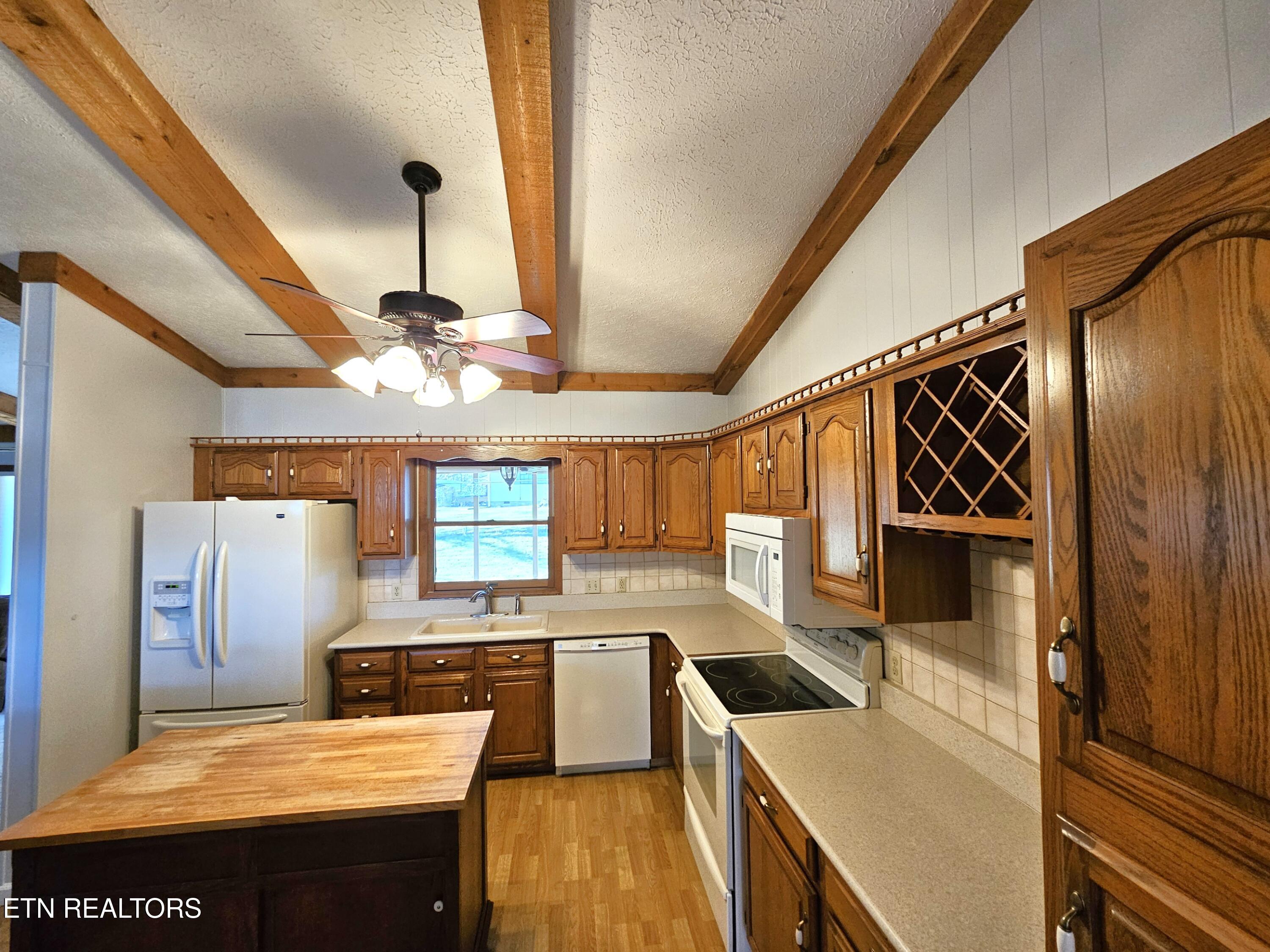 9430 North Ruggles Ferry Pike Strawberry Plains, TN 37871 - Photo 10 of 27 Kitchen view toward backyard
