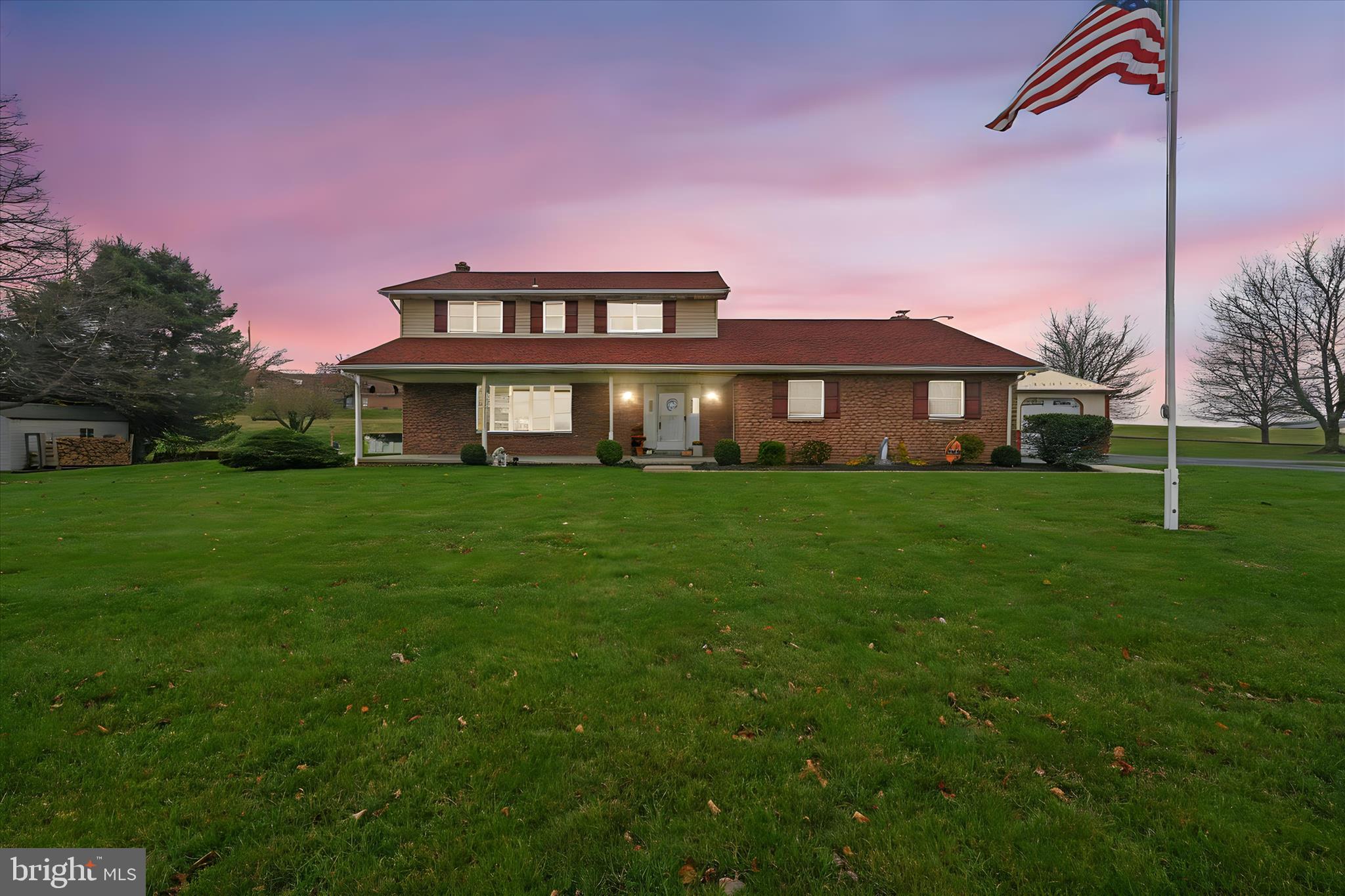 a view of a house with a big yard
